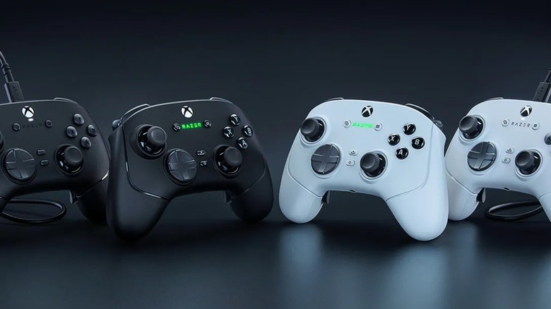 Black and White Razer Wolverine V3 Pro controllers lined up against a black background