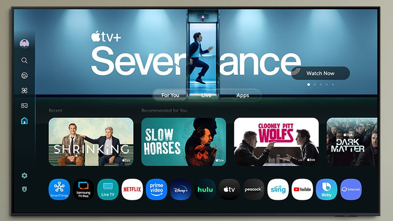 Samsung QN90F TV displaying Apple TV+ interface and streaming apps.
