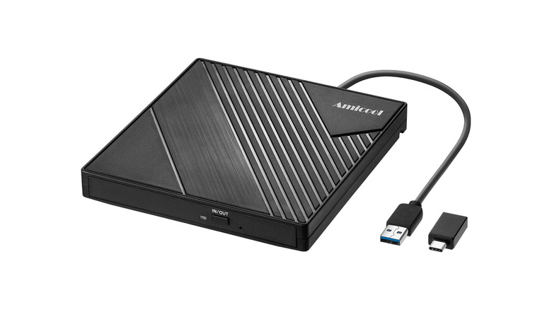 Portable USB CD/DVD player with adapter on white background