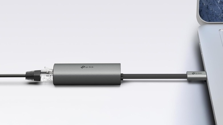 The TP-Link UE302C connected to a laptop's USB-C port