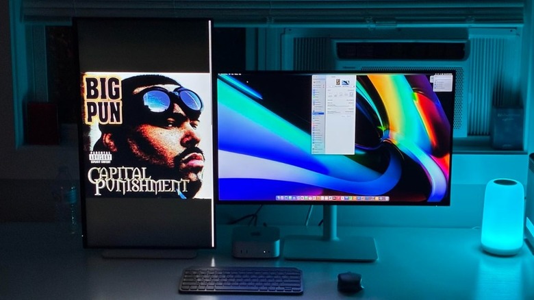Two Dell 27 Plus 4K S2725QS monitors, one in vertical orientation and one in horizontal orientation.