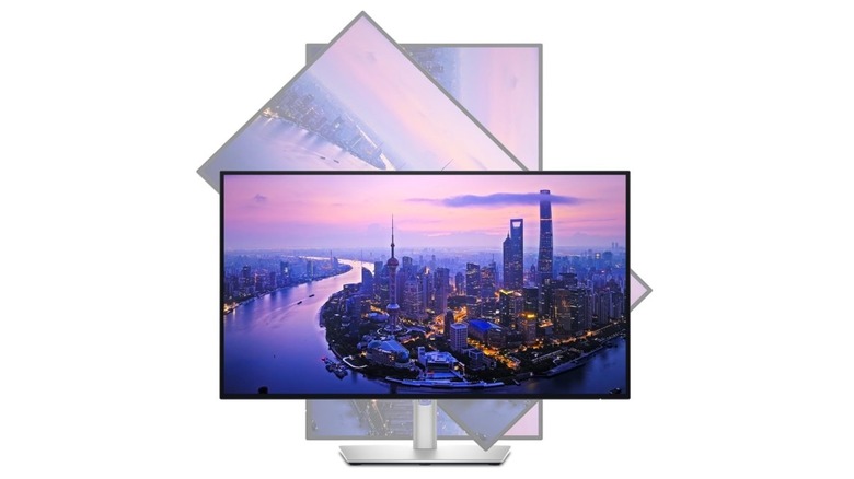 Dell UltraSharp U2725QE 27-inch rotating between horizontal and vertical orientations.