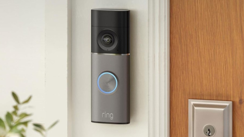 The Ring Battery Doorbell 4K Pro mounted beside an exterior door.