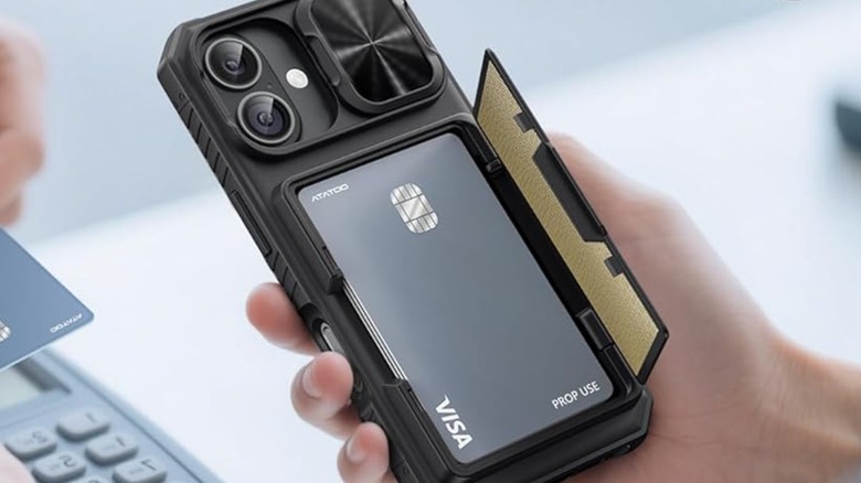 A closeup of a hand holding the Atatoo iPhone 17 Case Wallet with Slide Camera Cover