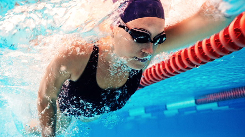 Close up of a woman swimming laps