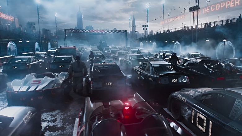 Cars lined up on a crowded highway during the race scene in Ready Player One