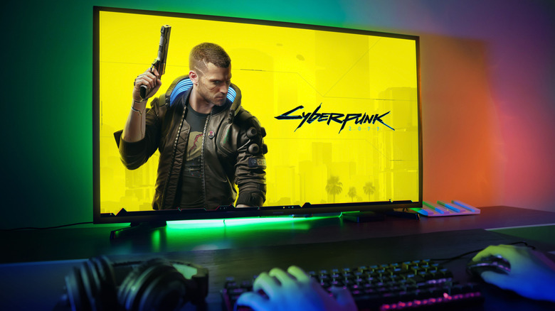 person playing Cyberpunk 2077 on a PC