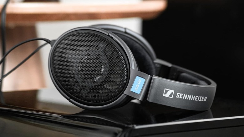 Sennheiser HD 600 resting on a shiny flat surface.
