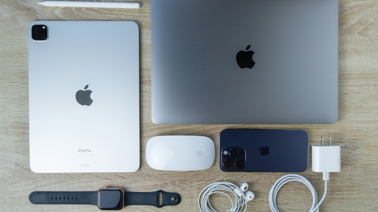 An image showing a user's Apple ecosystem, which includes the iPhone, Mac, and iPad.