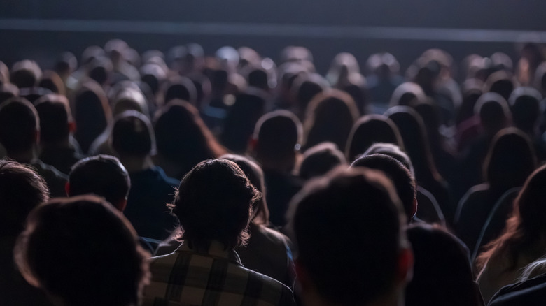 A large movie audience in a theater