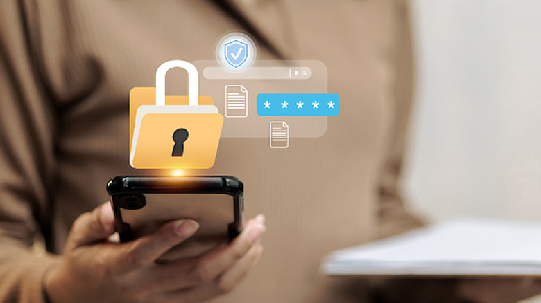 Person holding a smartphone with a digital folder icon with a lock sign over it