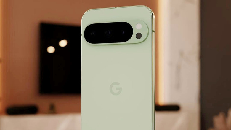 The Google Pixel 10 Pro standing upright on a flat surface.