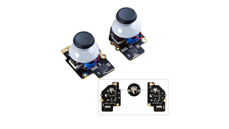 A pair of joysticks on circuit boards on a white background