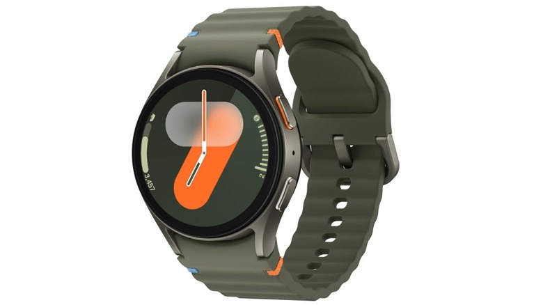 Samsung Galaxy Watch 7 with green sport band and circular display.