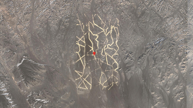 A series of lines on a desert location seen from a satellite