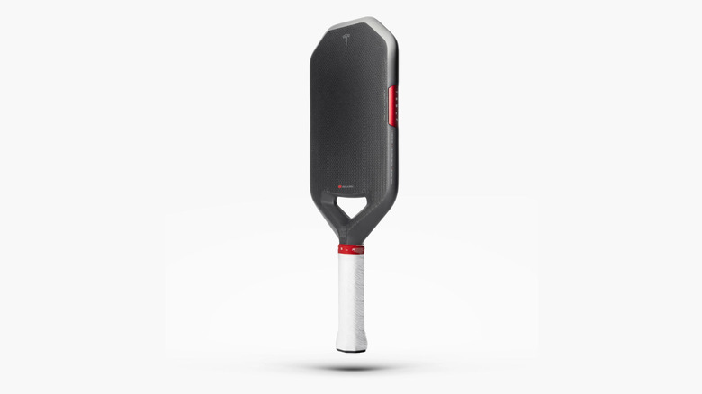 The Tesla Plaid Pickleball Paddle against a light gray background