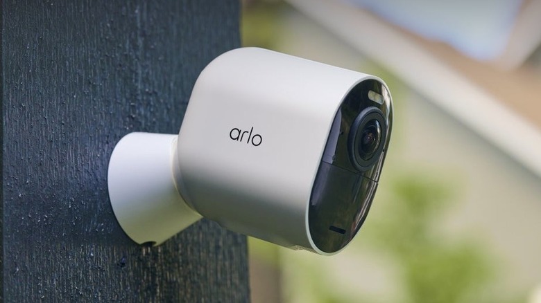 The Arlo Ultra 3rd Gen VMS5250 mounted on an exterior wall of a house