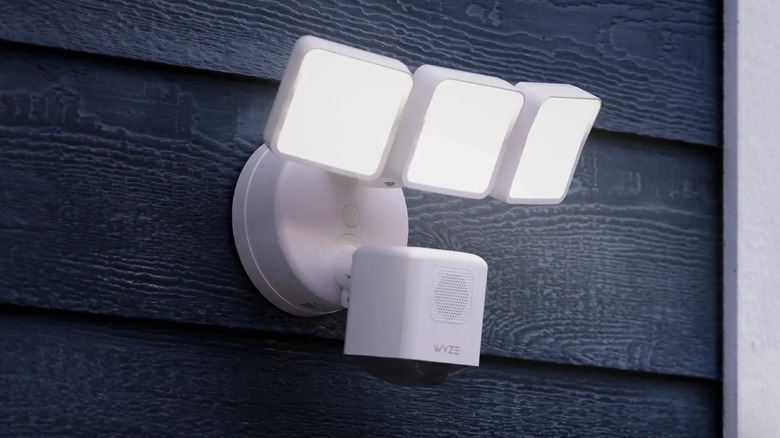 The Wyze Cam Floodlight Pro mounted on an exterior wall of a house