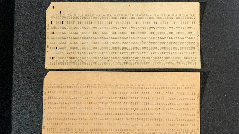 A pair of data storage punch cards.