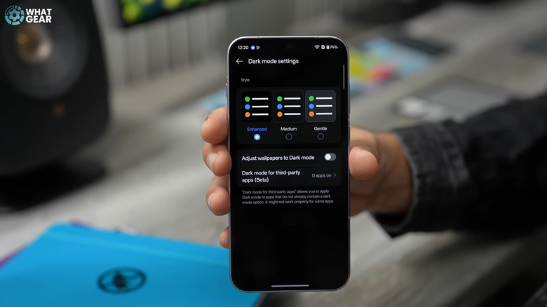 Hand holding OnePlus showing Dark mode settings hidden feature