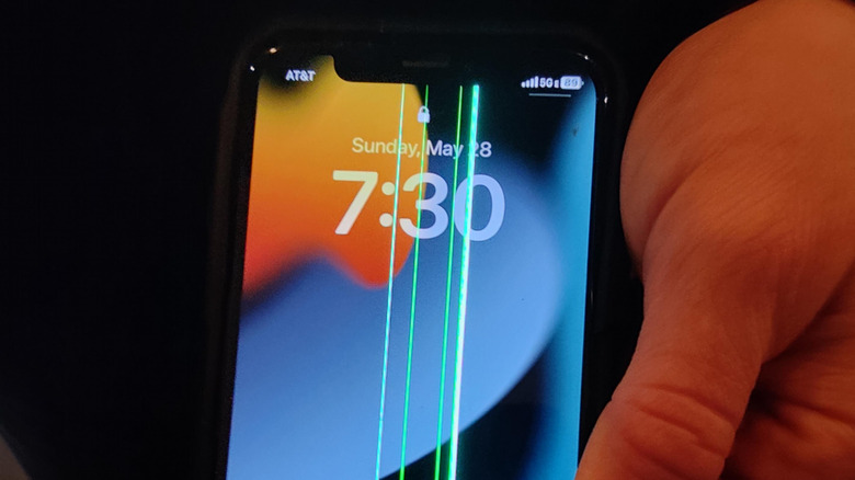 An image showing green lines appearing on a phone screen