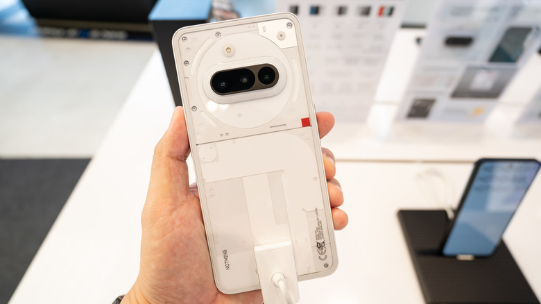 The Nothing Phone 3a in hand.