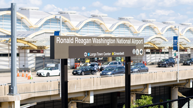A directional sign for Ronald Reagan Washington National Airport.