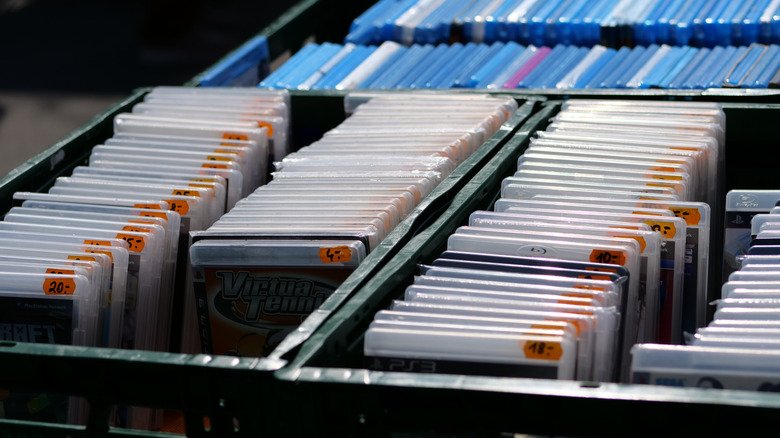 Boxes of old Blu Rays and PlayStation 3 games