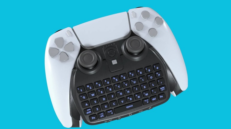 Mini keyboard attachment connected to a PS5 DualSense controller on a blue background.