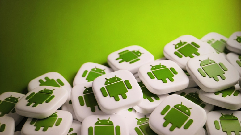 Pile of white squares with Android logos on them