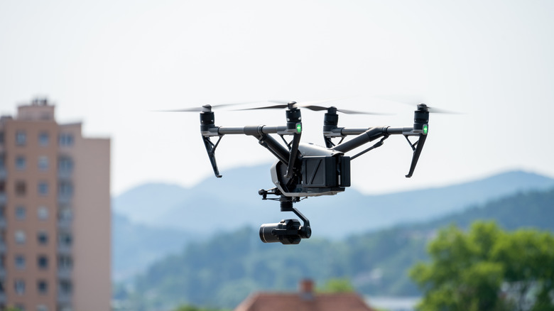 A drone filming over a cityscape