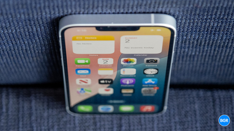 Downward angle view of front screen of iPhone 16e display