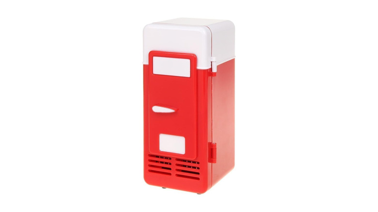 A red USB mini fridge on a white background