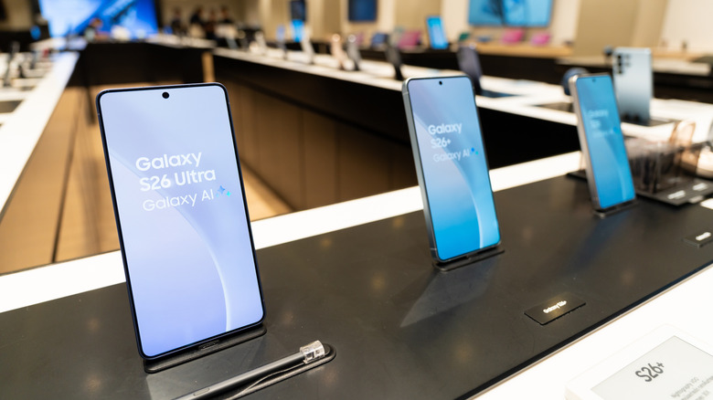 Samsung Galaxy S26 Ultra and Galaxy S26+ phones displayed in a store.