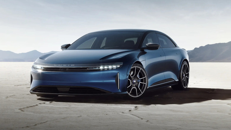 Lucid Air Sapphire electric sedan parked on a desert road.