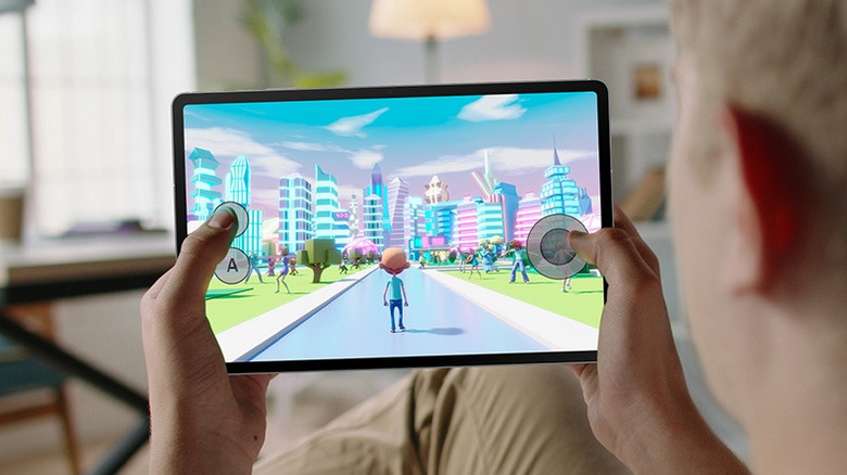 Person playing a game on a Samsung Galaxy Tab S10 FE+ tablet.