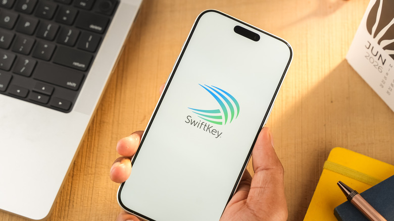 Microsoft SwiftKey logo is displayed on a smartphone screen