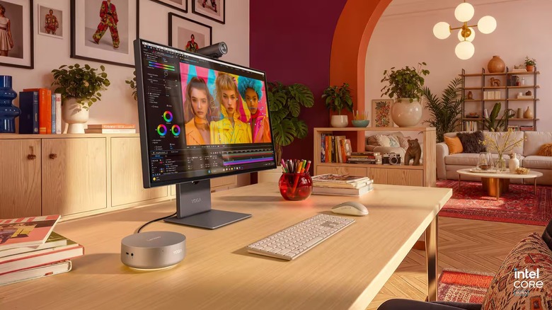 Lenovo Yoga Mini pc connected to a monitor on a desk with wireless keyboard and mouse