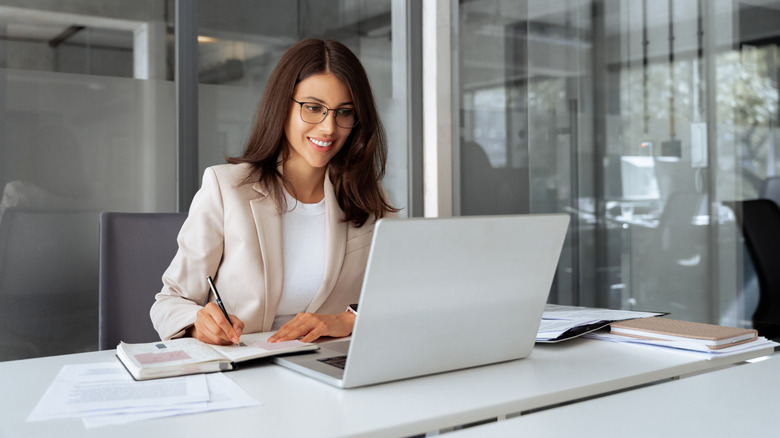 An office worker on a laptop.