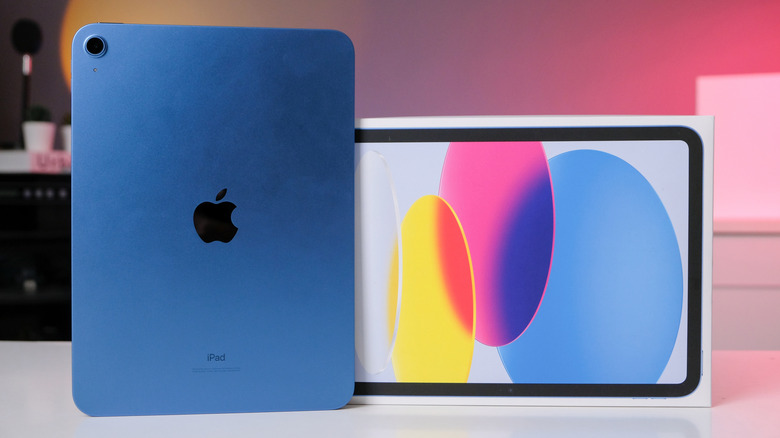 An iPad 10 next to its retail box.