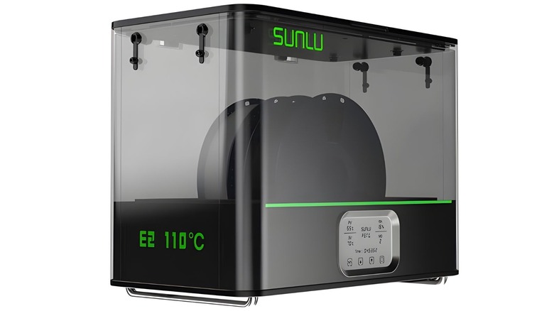 Sunlu E2 filament dryer on a white background whilst evaporating moisture from two filament rolls.
