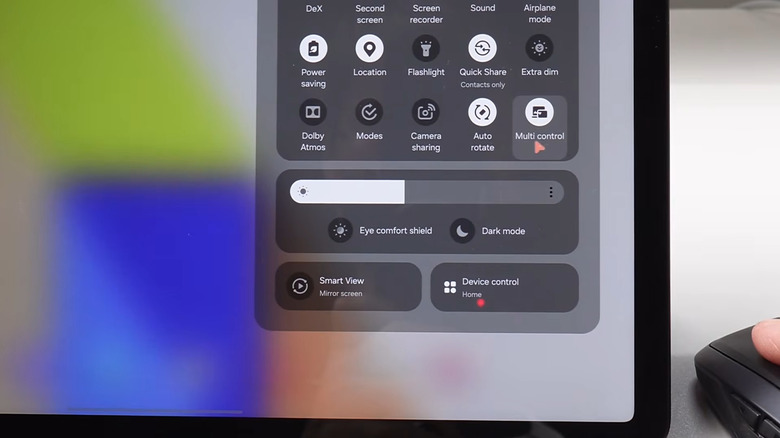 A Samsung tablet showing a mouse clicking on Multi control in the Quick Settings panel