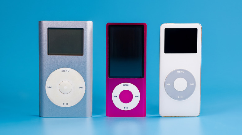 Assorted Apple iPod models on blue background
