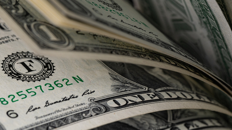 stack of one dollar bills close-up