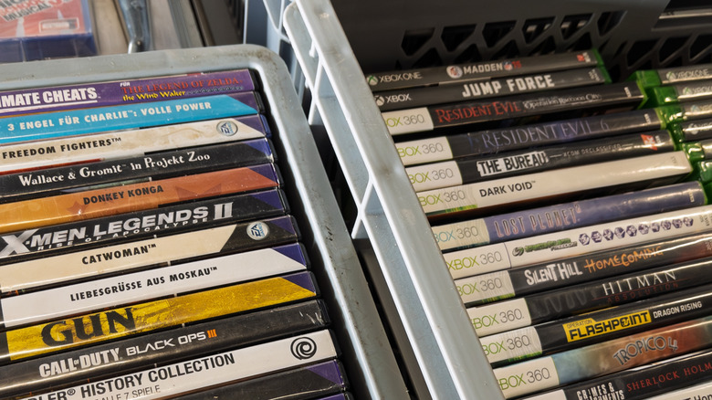 Video games in bins at a store