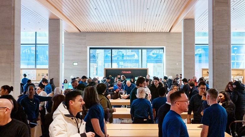 Customers shopping at an Apple Store