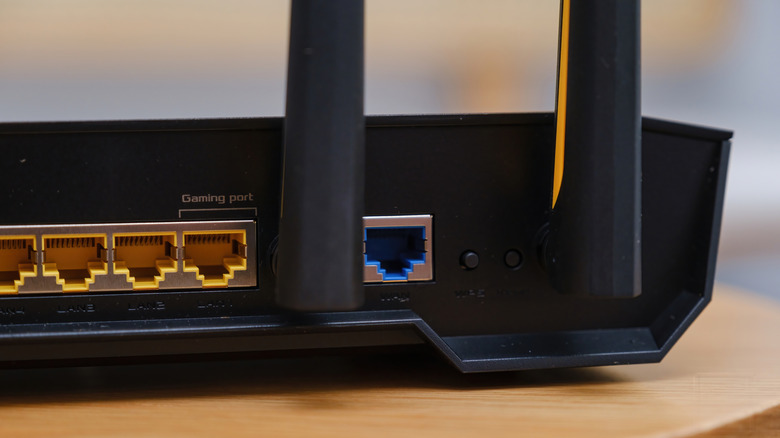 The back of a Asus router showing various ports