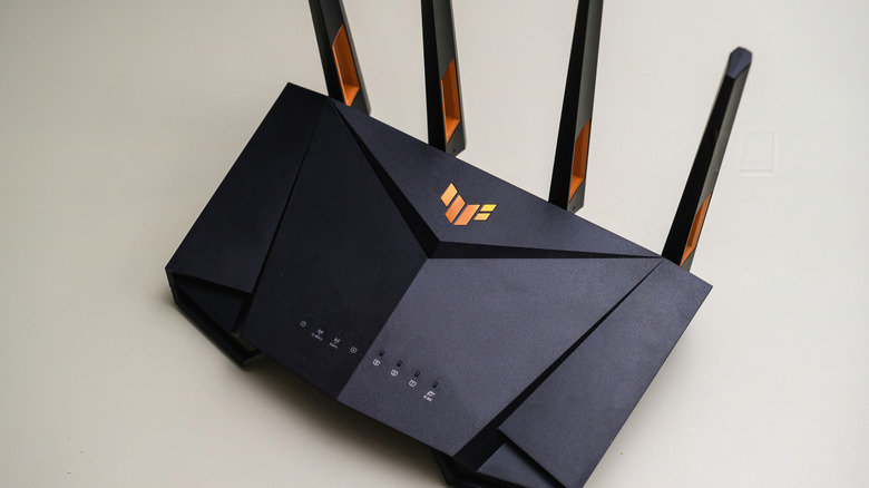 An asus gaming router with four antennas