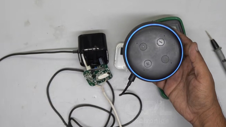 Person working on a power adapter