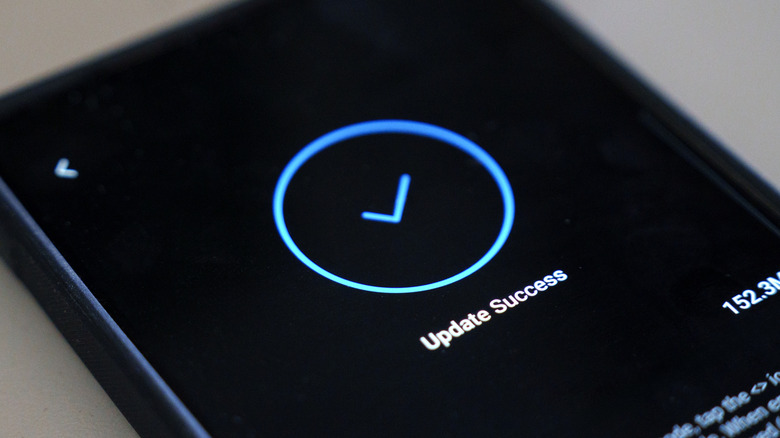 Smartphone screen showing a successful software update